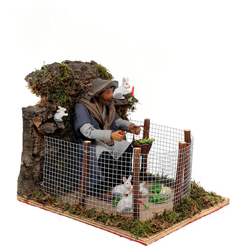 Homem alimentando coelhos no cercado MOVIMENTO para presépio napolitano com figuras altura média 24 cm 4