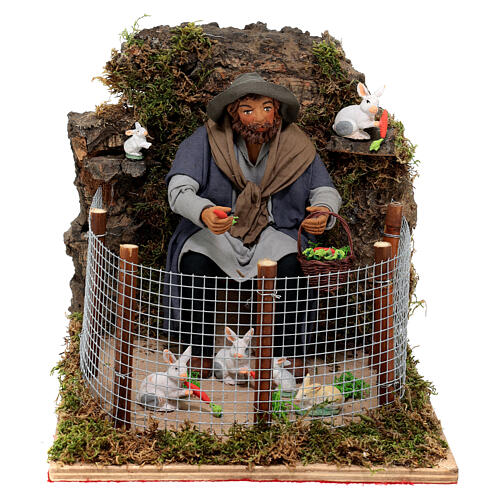 Man feeding rabbits in pen 24 cm ANIMATED Naples nativity scene 1