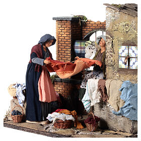Scena lavandaie con fontana movimento presepe 30 cm 35x45x35