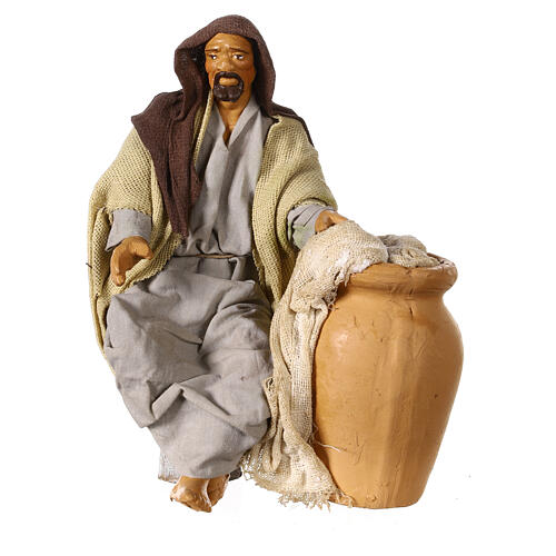 Uomo seduto accanto all'anfora presepe napoletano 15 cm 1