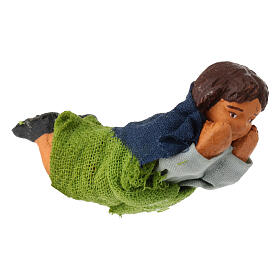 Little girl lying down Neapolitan nativity 10 cm