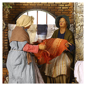 Animated scene of women doing laundry with dripping clothes, Neapolitan Nativity Scene with characters of 30 cm