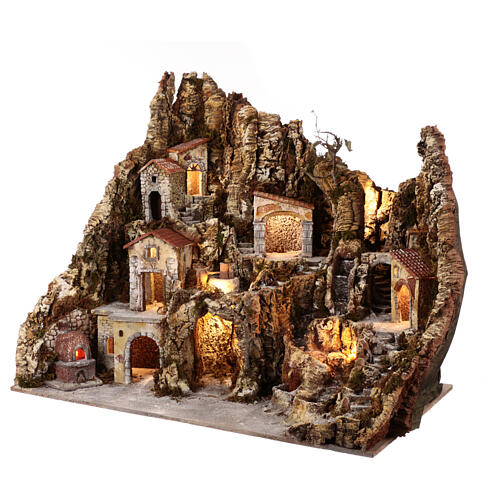 Village dans la roche avec meule four fontaine ruisseau et éclairage LED 85x100x55 cm pour figurines de 10-12 cm 3