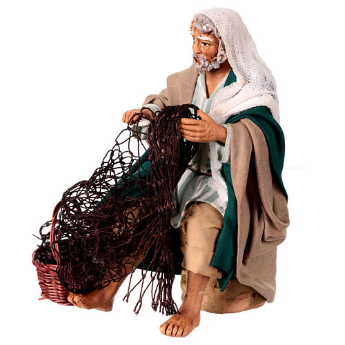Seated fisherman spinning Neapolitan nativity scene 14 cm 4