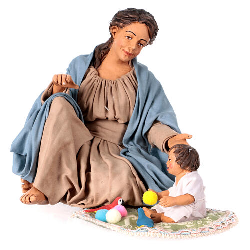 Mother playing with her child on the ground, terracotta figurine for 30 cm Neapolitan Nativity Scene 4