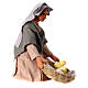 Donna con cesto pulcini inginocchiata 13 cm 10x5x10 cm s3