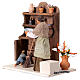 Woman with plate and dresser for 30 cm animated Nativity Scene, 30x20x30 cm s4