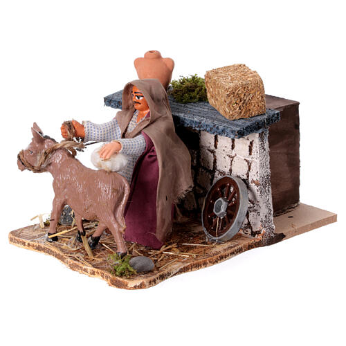 Farmer grooming a donkey, animated scene for 8 cm Neapolitan Nativity Scene 2