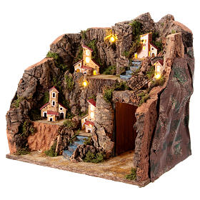 Lighted Nativity scene village cave houses at distance 12 cm 35x35x25 cm