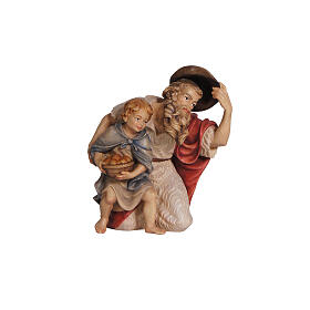Shepherd on his knees with a child, painted wood, 9.5 cm Heimatland Nativity Scene of Val Gardena