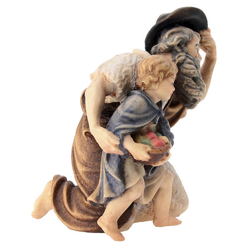Shepherd on his knees with a child, painted wood, 9.5 cm Heimatland Nativity Scene of Val Gardena 2