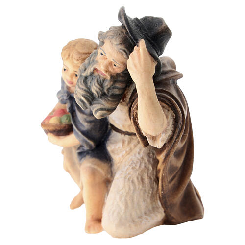 Shepherd on his knees with a child, painted wood, 9.5 cm Heimatland Nativity Scene of Val Gardena 3