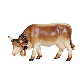 Vaca pastando peça de madeira pintada para presépio Heimatland 9,5 cm Val Gardena