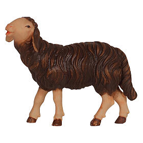 Ovelha negra com cabeça erguida a comer, presépio 12 cm Heimatland, madeira pintada Val Gardena