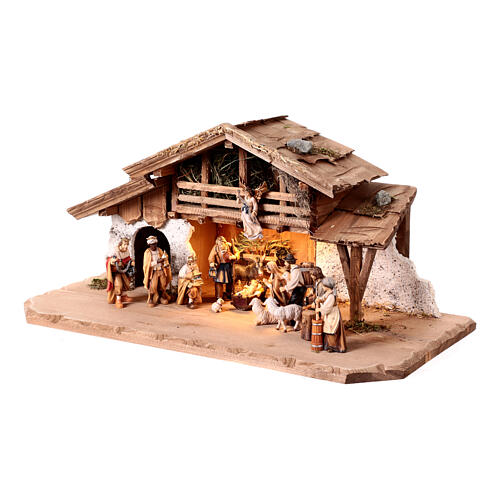 Illuminated Alpine hut with 17 painted wood characters for 9.5 cm Heimatland Nativity Scene, Val Gardena 3