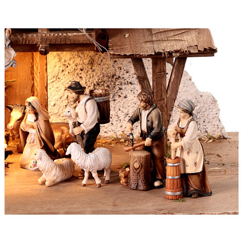 Illuminated Alpine hut with 17 painted wood characters for 9.5 cm Heimatland Nativity Scene, Val Gardena 6