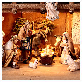 Illuminated alpine nativity stable set 17 pieces 9.5 cm painted wood Heimatland Val Gardena nativity scene