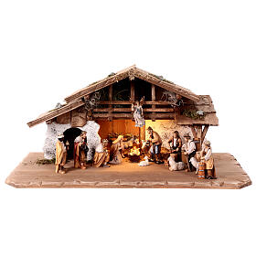 Alpine stable with lights and 17 painted wood characters for 12 cm Heimatland Nativity Scene, Val Gardena