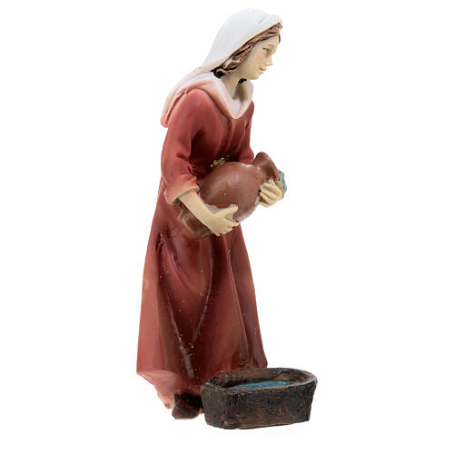 Nativity scene girl pouring water in colored resin h 12 cm 3