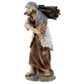 Pastore con tronchi di legno sulla schiena resina colorata presepe h 12 cm