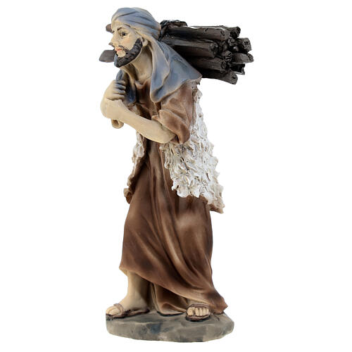 Shepherd with wooden trunks on his back in colored resin, nativity scene h 12 cm 2
