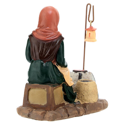 Woman roasting chestnuts for Nativity Scene with 10 cm resin figurines 4