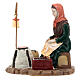 Woman roasting chestnuts for Nativity Scene with 10 cm resin figurines s1
