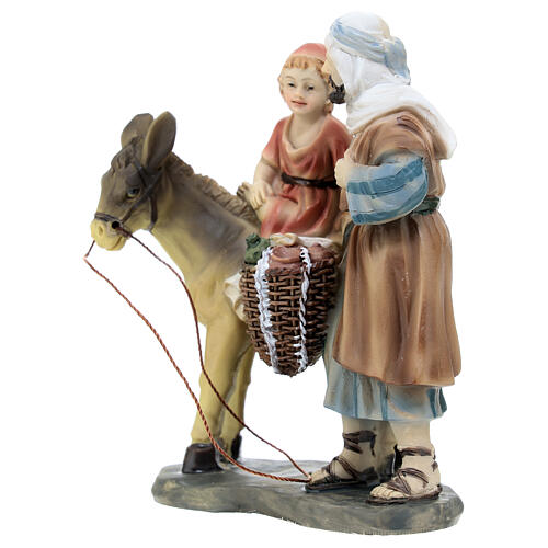 Shepherd with child on donkey in colored resin, nativity scene h 12 cm 2