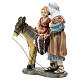 Shepherd with child on donkey in colored resin, nativity scene h 12 cm s2