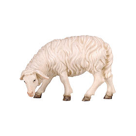 Owca jedząca z głową skierowaną w lewo, 12 cm szopka Mahlknecht, drewno malowane Val Gardena