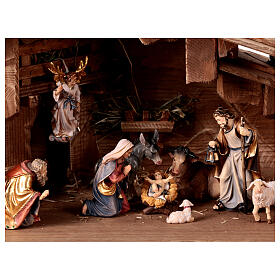 Sacred Night Stable with Nativity set 15 pcs painted wood 9.5 cm Mahlknecht Val Gardena nativity scene