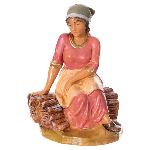 Mädchen, auf einem Holzstapel sitzend, Krippenfigur, PVC, Fontanini, 12 cm 1