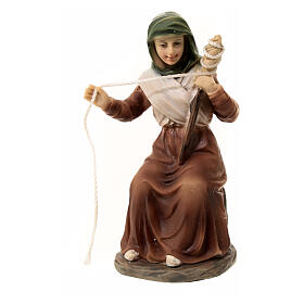 Statua filatrice resina dipinta presepe 11 cm
