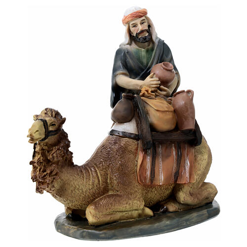 Wielbłąd i beduin żywica malowana, szopka 11 cm 2