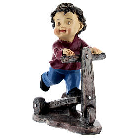 Child on a kick scooter for 9 cm resin baby Nativity Scene