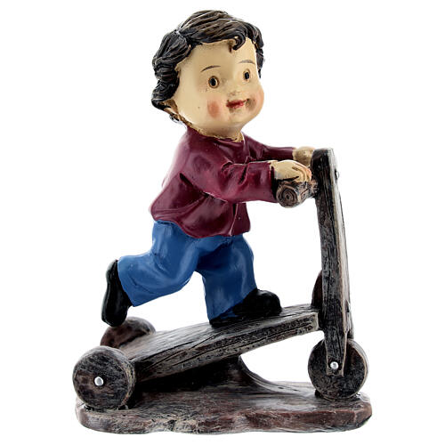 Child on a kick scooter for 9 cm resin baby Nativity Scene 1