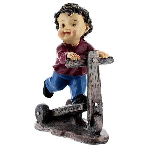 Child on a kick scooter for 9 cm resin baby Nativity Scene 2