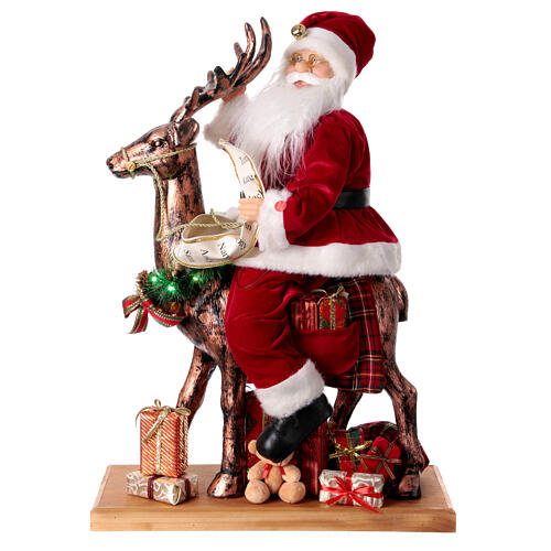 Père Noël avec elfe traineau lumières mouvement musique 55x80x20 cm 1