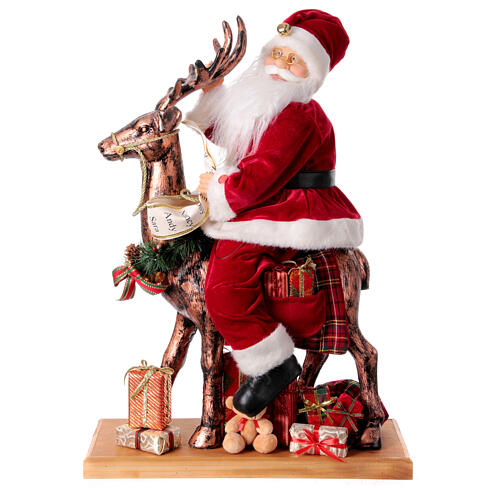 Père Noël avec elfe traineau lumières mouvement musique 55x80x20 cm 10