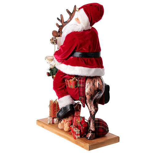 Babbo Natale con elfo slitta luci movimento musica 55x80x20 cm 7
