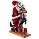 Babbo Natale con elfo slitta luci movimento musica 55x80x20 cm s6