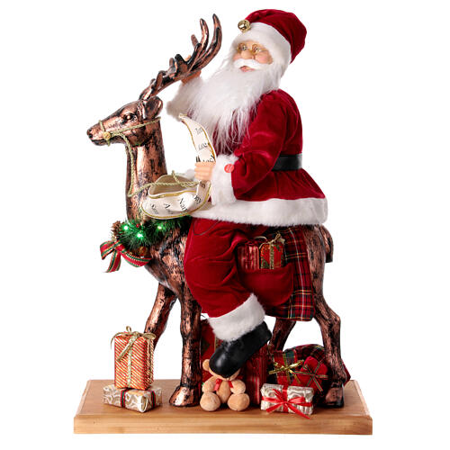 Santa Claus on reindeer with lights motion music, 55x80x20 cm 1