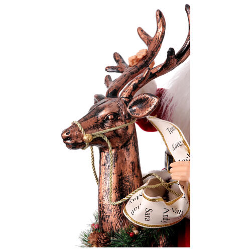 Santa Claus on reindeer with lights motion music, 55x80x20 cm 5