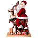 Santa Claus on reindeer with lights motion music, 55x80x20 cm s10