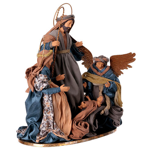 Winter Elegance Holy Family with angel, fabric and resin, h 45 cm 7