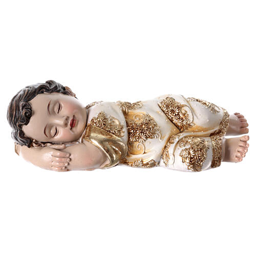 Baby Jesus figurine sleeping on his side gold details 5x12x5 cm 1
