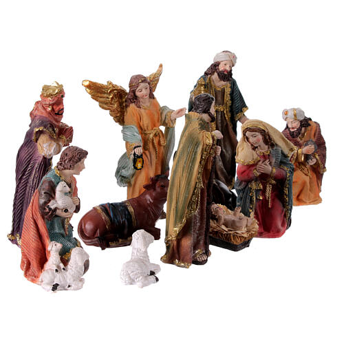Complete nativity set of 11 colored resin subjects 20 cm 5