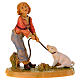 Bambino h 12 cm presepe Fontanini con maialino s1