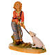 Bambino h 12 cm presepe Fontanini con maialino s2