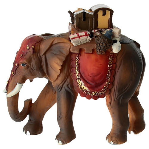 Éléphant avec selle et nourriture crèche 9 cm résine 1